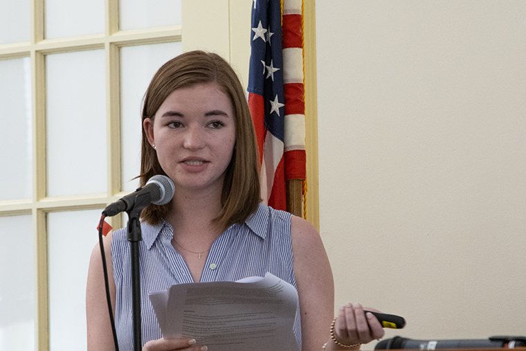 Claire Garretson '24 speaks during a presentation of students' findings regarding perceptions of civic engagement on campus.