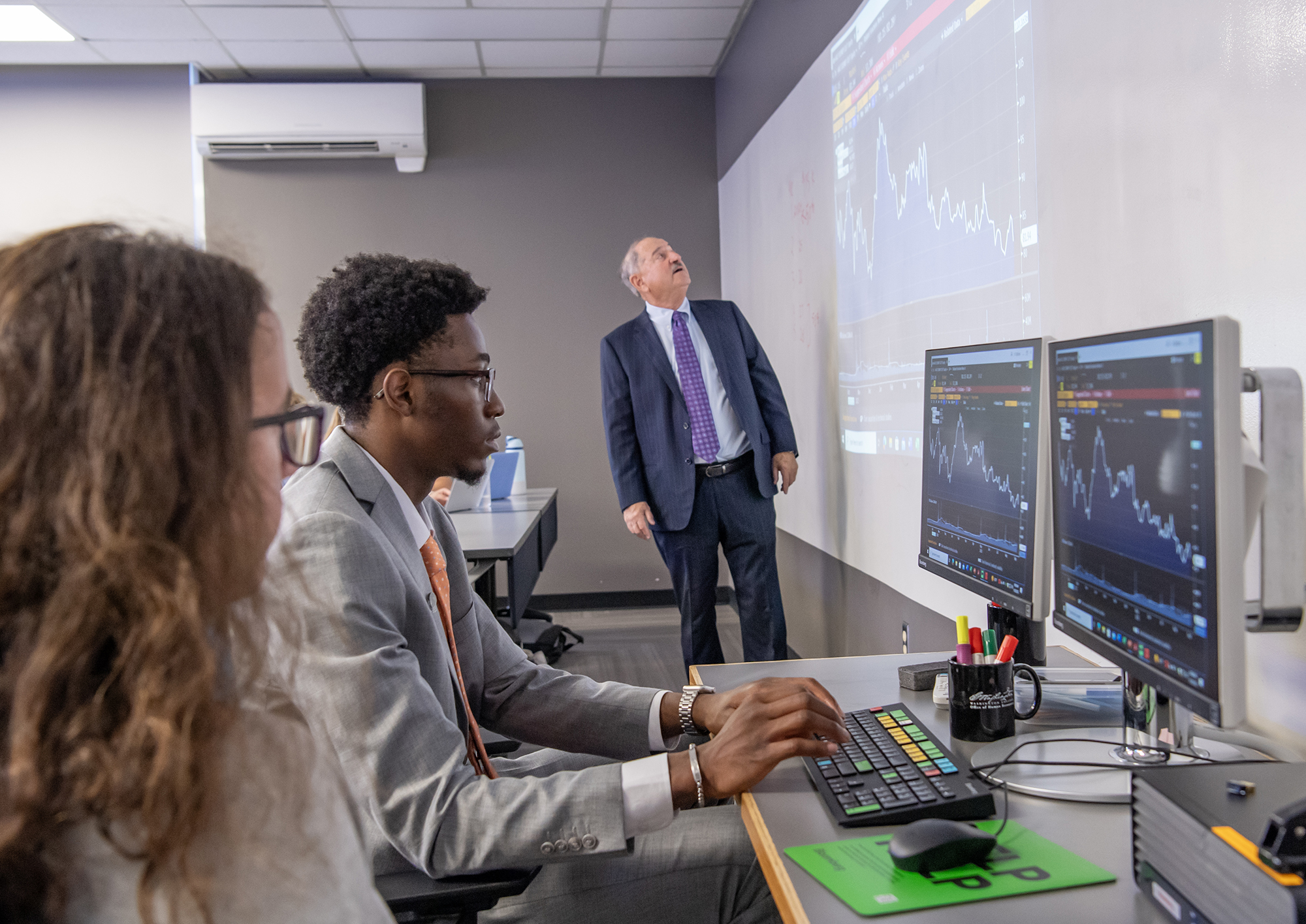 student using bloomberg terminal