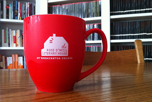 Rose O'Neill Literary House red mug in Penguin Library located in Literary House