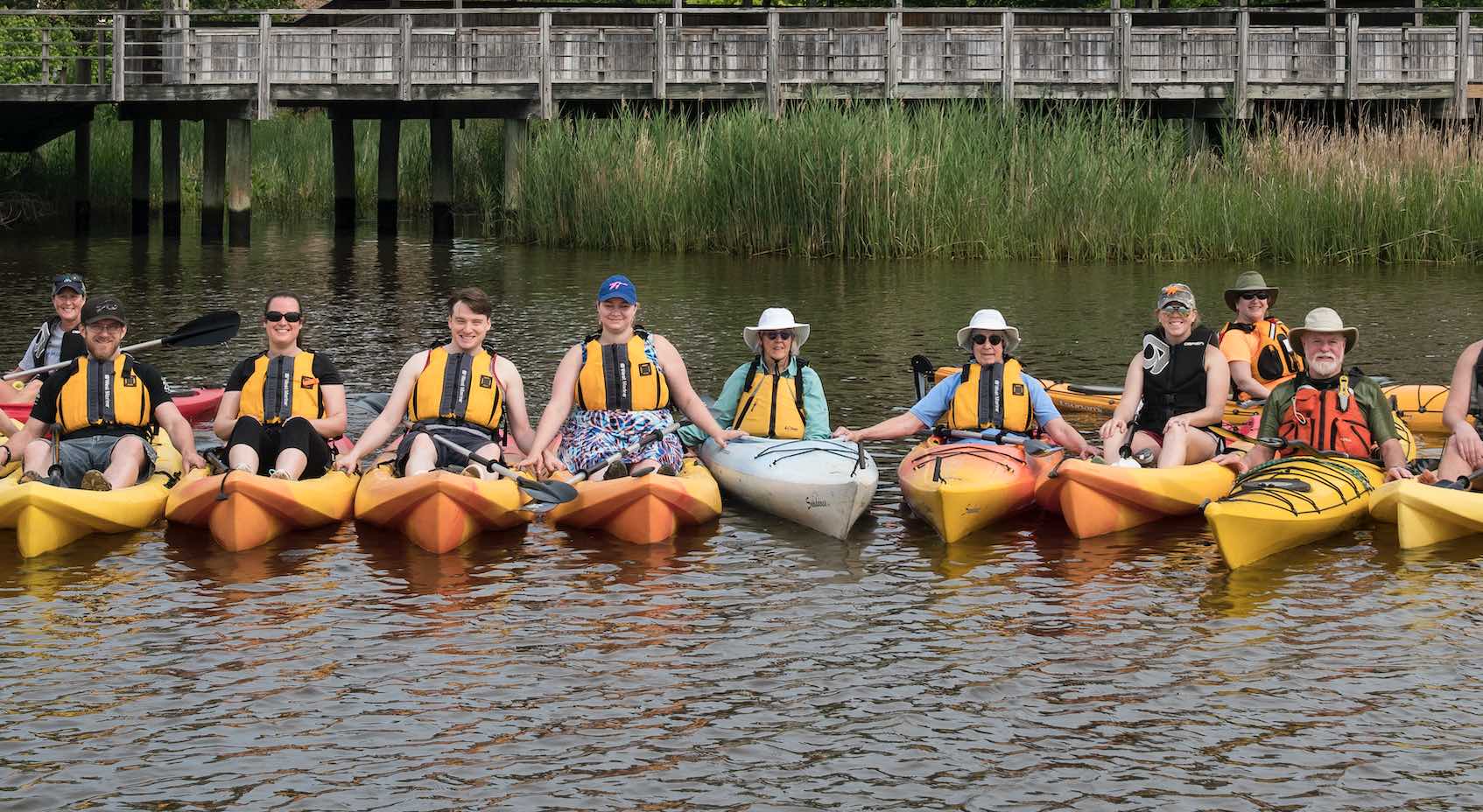 Alumni gathered for a kayak tour