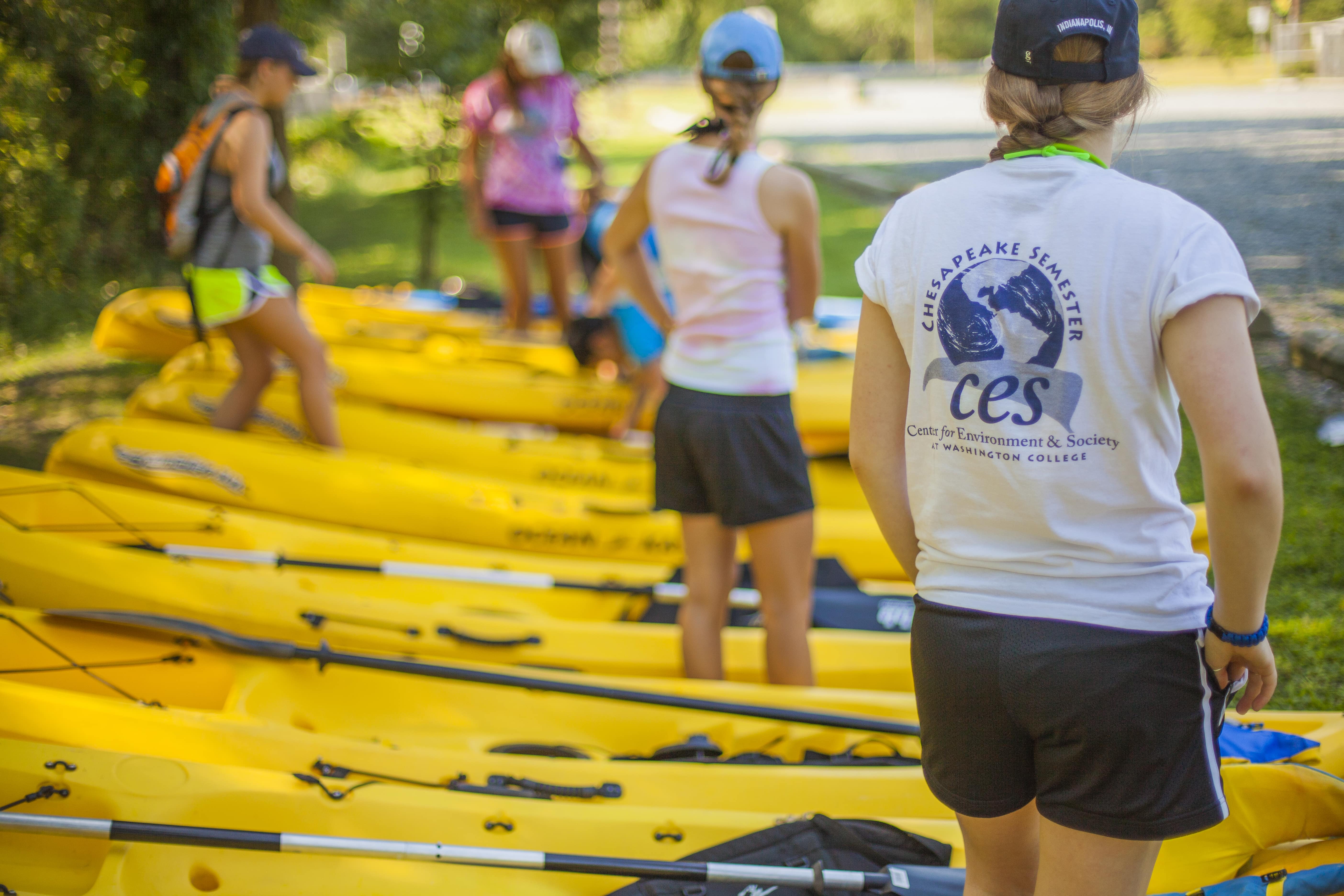 Chesapeake Semester participants prepare their kayaks for the river