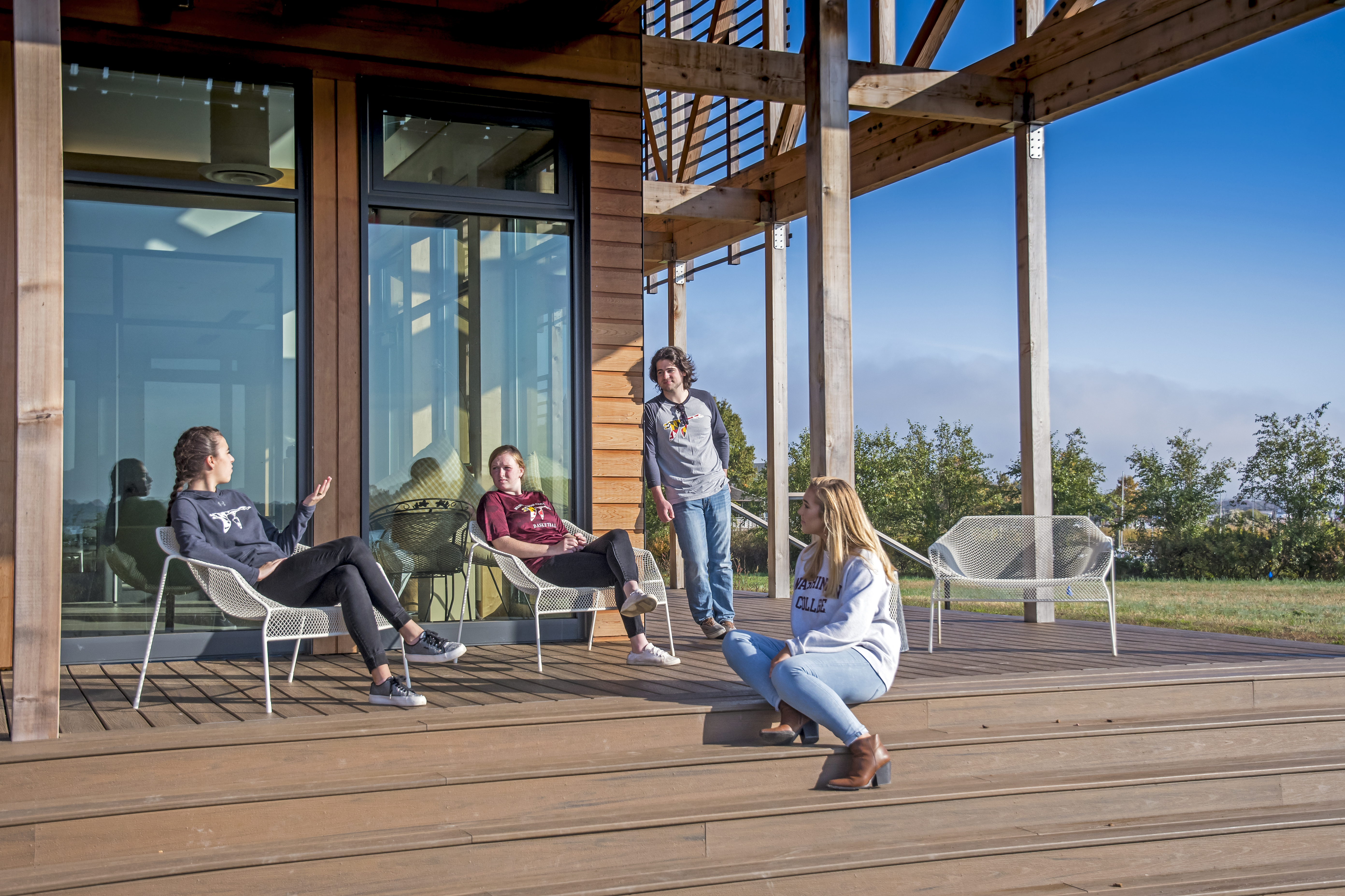 student's hanging out on the SGEH deck