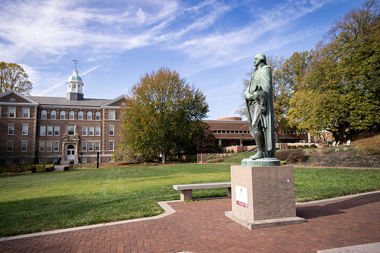 George Washington statue in foreground; Smith Hall in background
