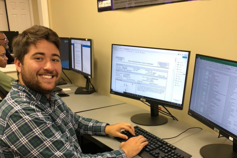 Bryce Robertson, '22 working at GIS computer station