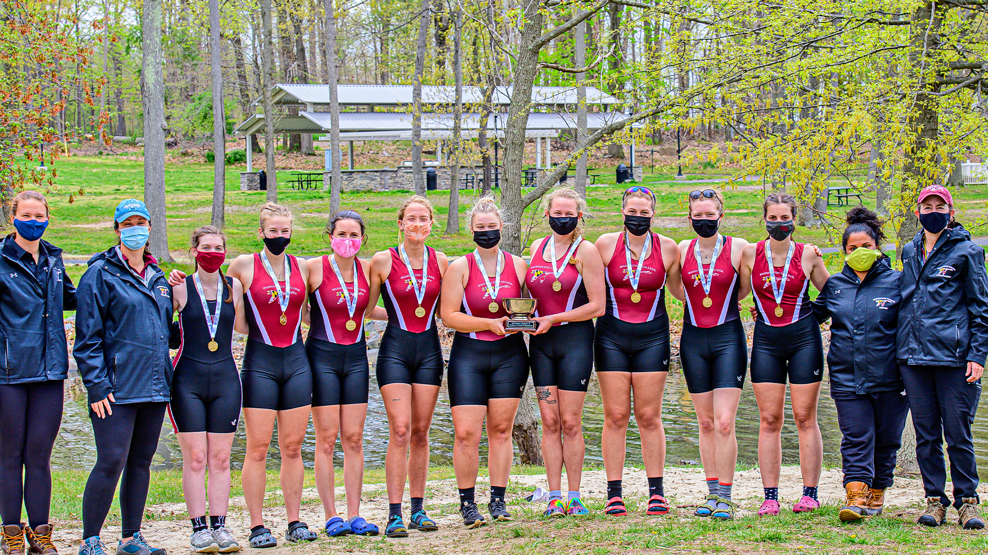 Women's Rowing team winning a prize