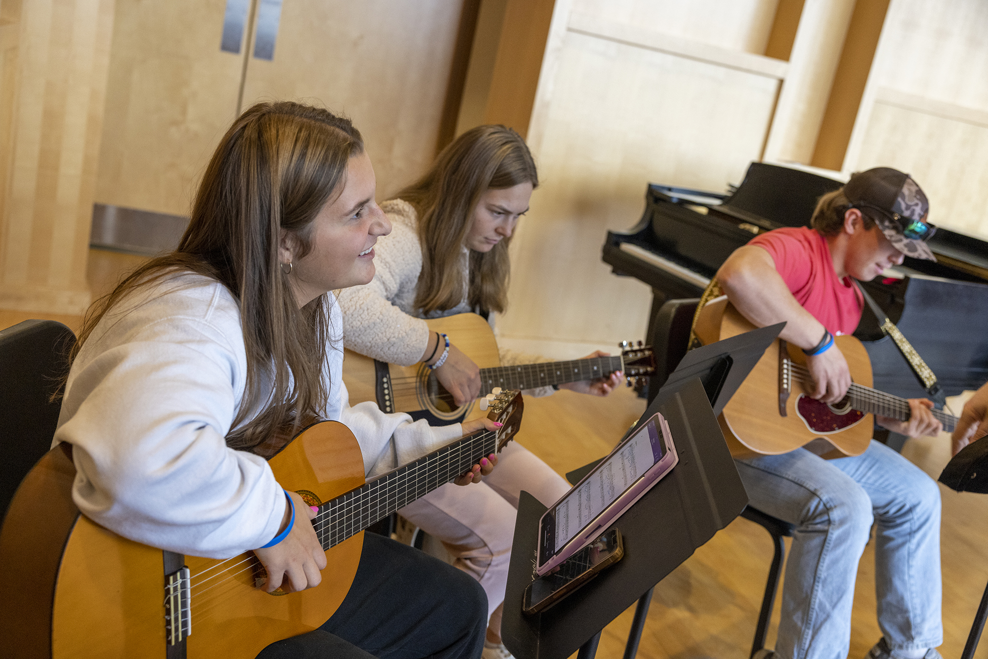student in guitar class