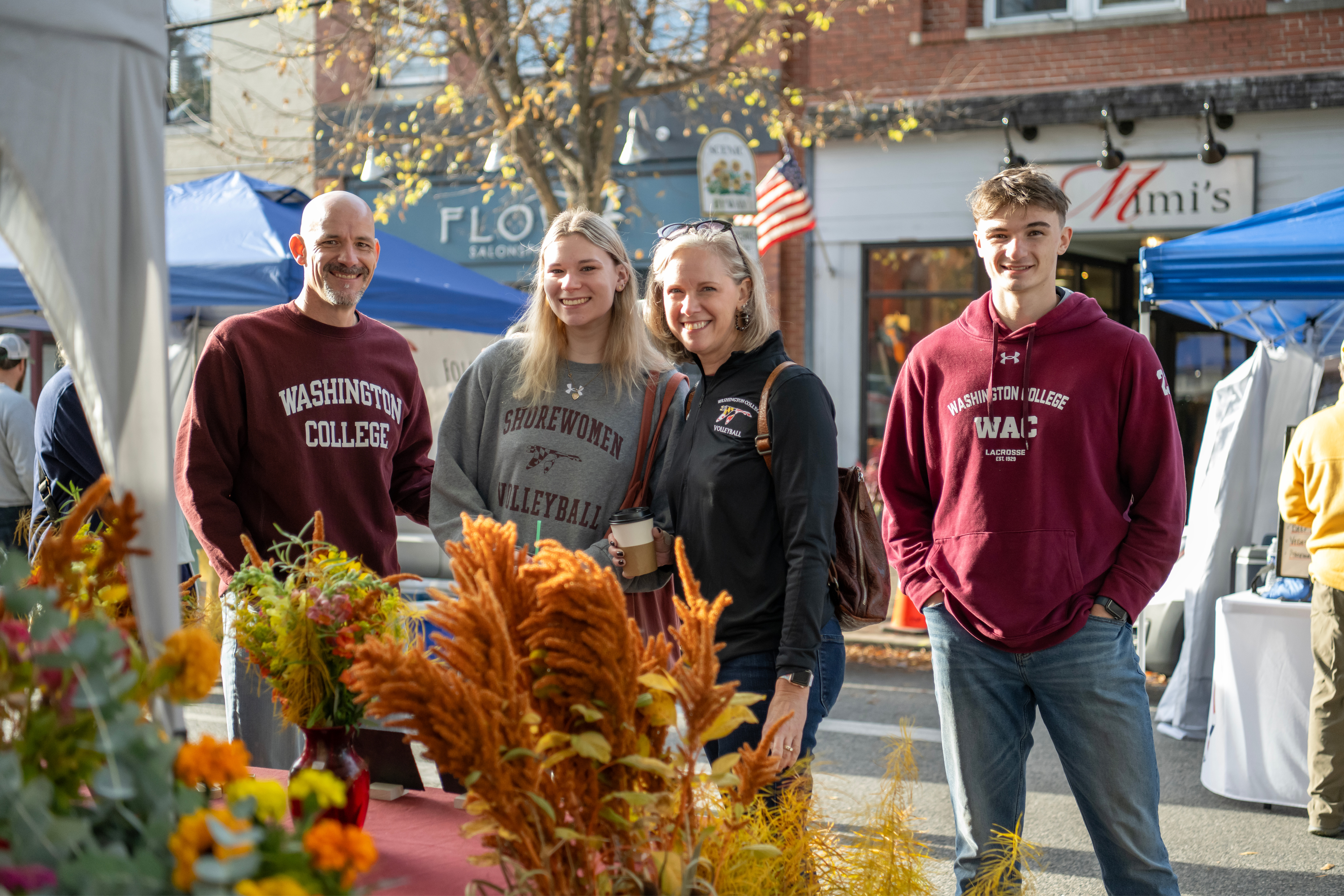 parents and students standing behind flowers on High Street Chestertown