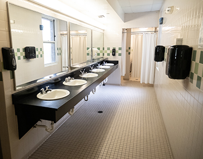 row of sinks in bathroom