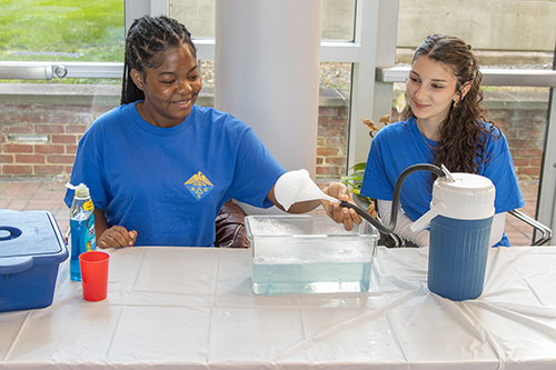 american chemical society students demonstrating an experiment