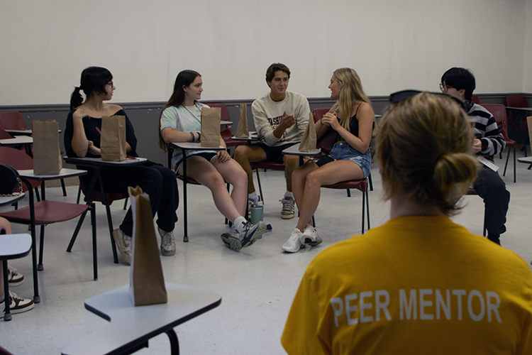 an explore! group with their peer mentor