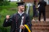 A graduate fist pumps after receiving his diploma. [photo]