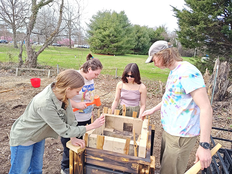 Students working in Poetry Garden