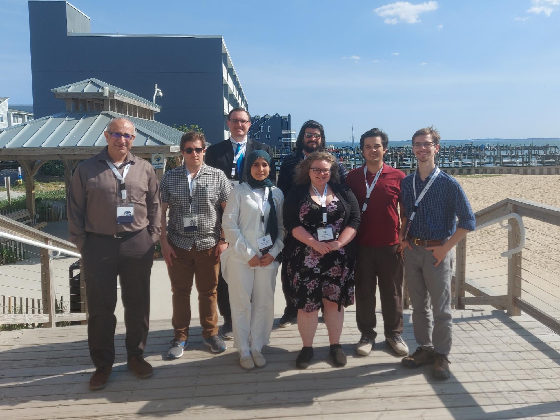 Group photo of the GIS staff near the beach