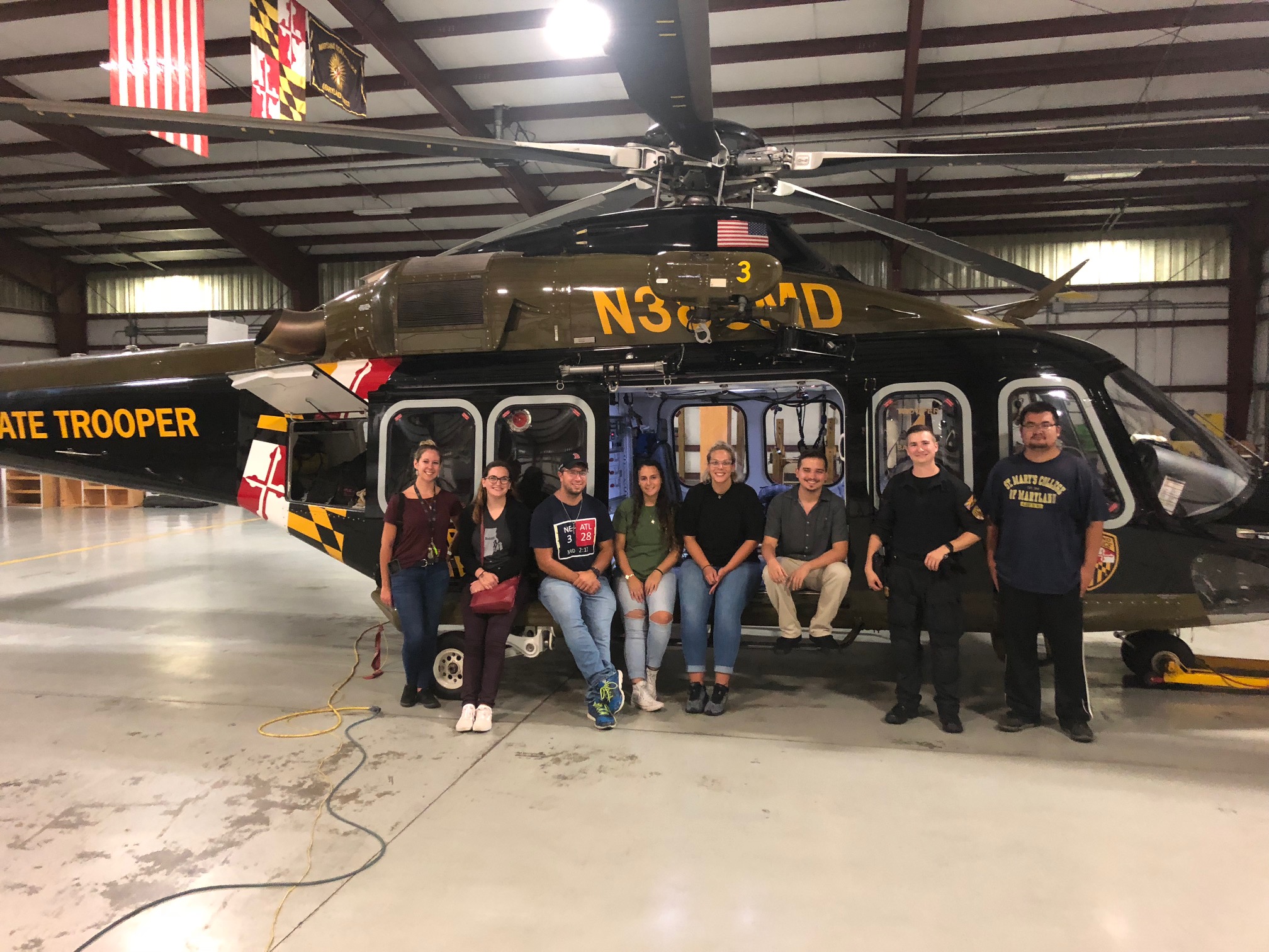 Group sitting on helocopter