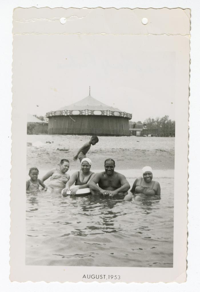 Image of people at Carr beach