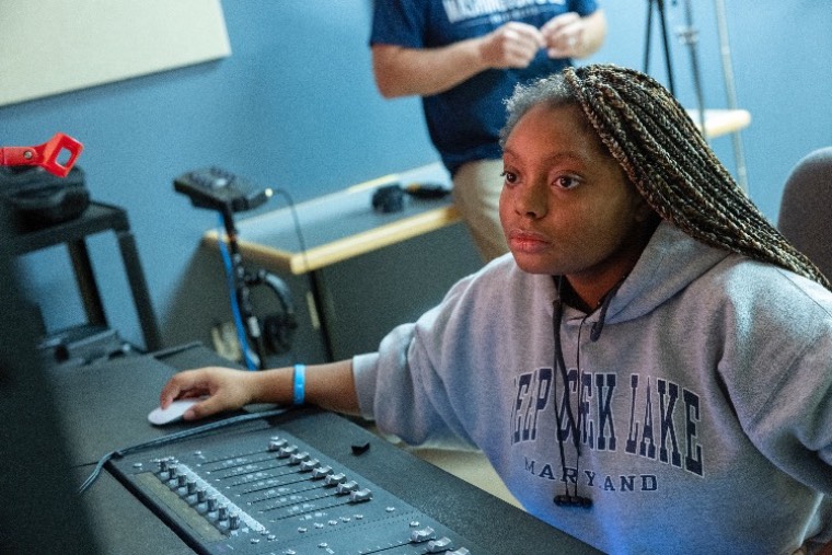 A student mixes music in a Washington College studio