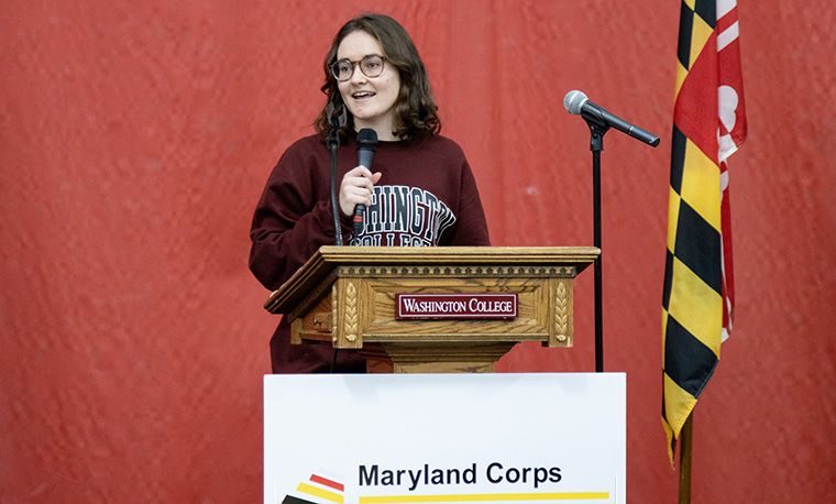 Jocelyn Ball '29 speaks at this year's conference as a student after attending as a service corps member the year before.