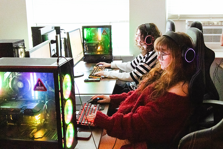 Julia Soanes '29 (front) and Casey Johnson '29 play games together in the Esports room during the last Mindsets and Multikills class of the semester.