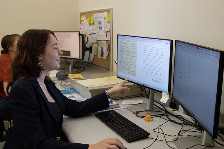 /live/news/_images/nora-at-desk.jpg