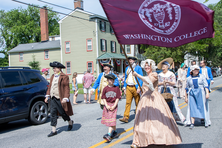 Washington College President Sosulski and colleagues walk in the annual Chestertown Tea Party Festival parade. 