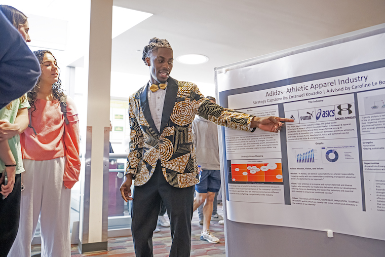 A student at Washington College presents his Senior Capstone Experience on the business of Adidas. 