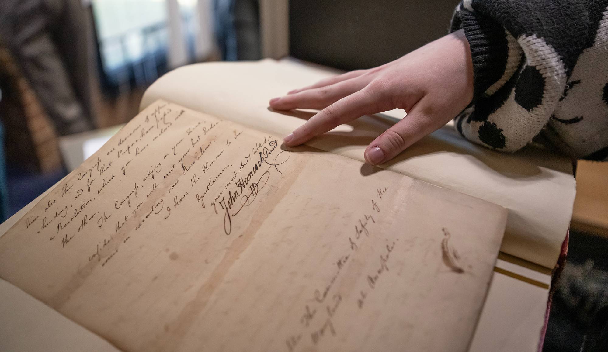 student working in an archive