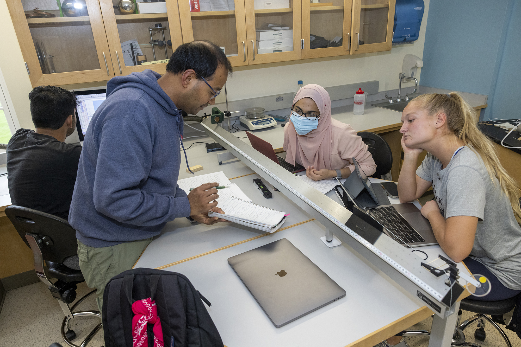 students learning from professor