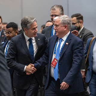 Murray shakes hands with Secretary of State Antony Blinken