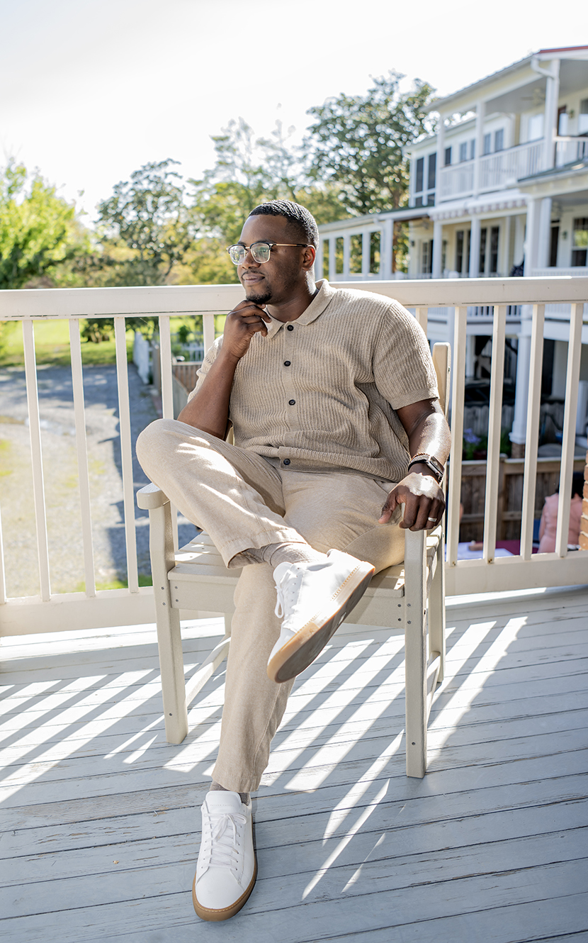 Darius Johnson sits on the deck at the Custom House.