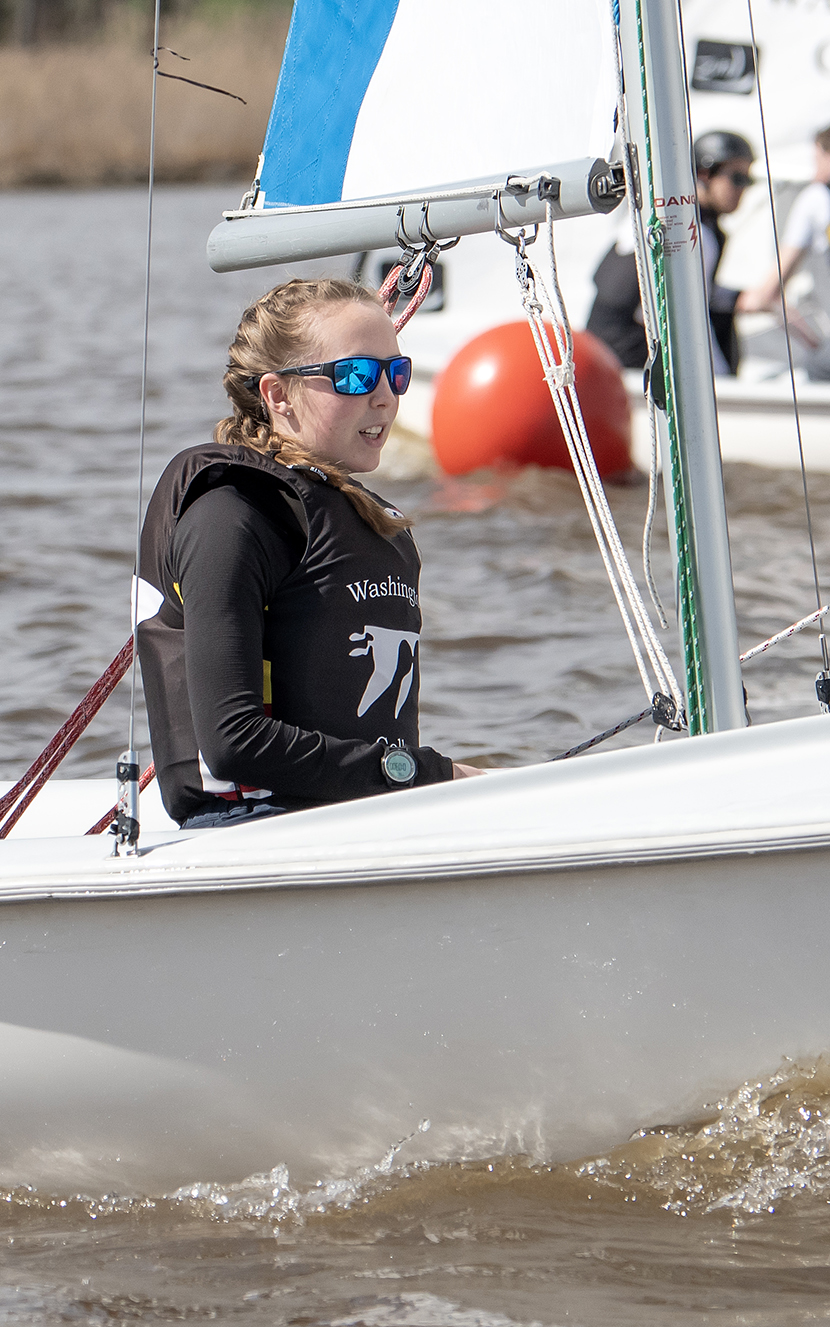 Rachel Morgen on a boat during a sailing race.