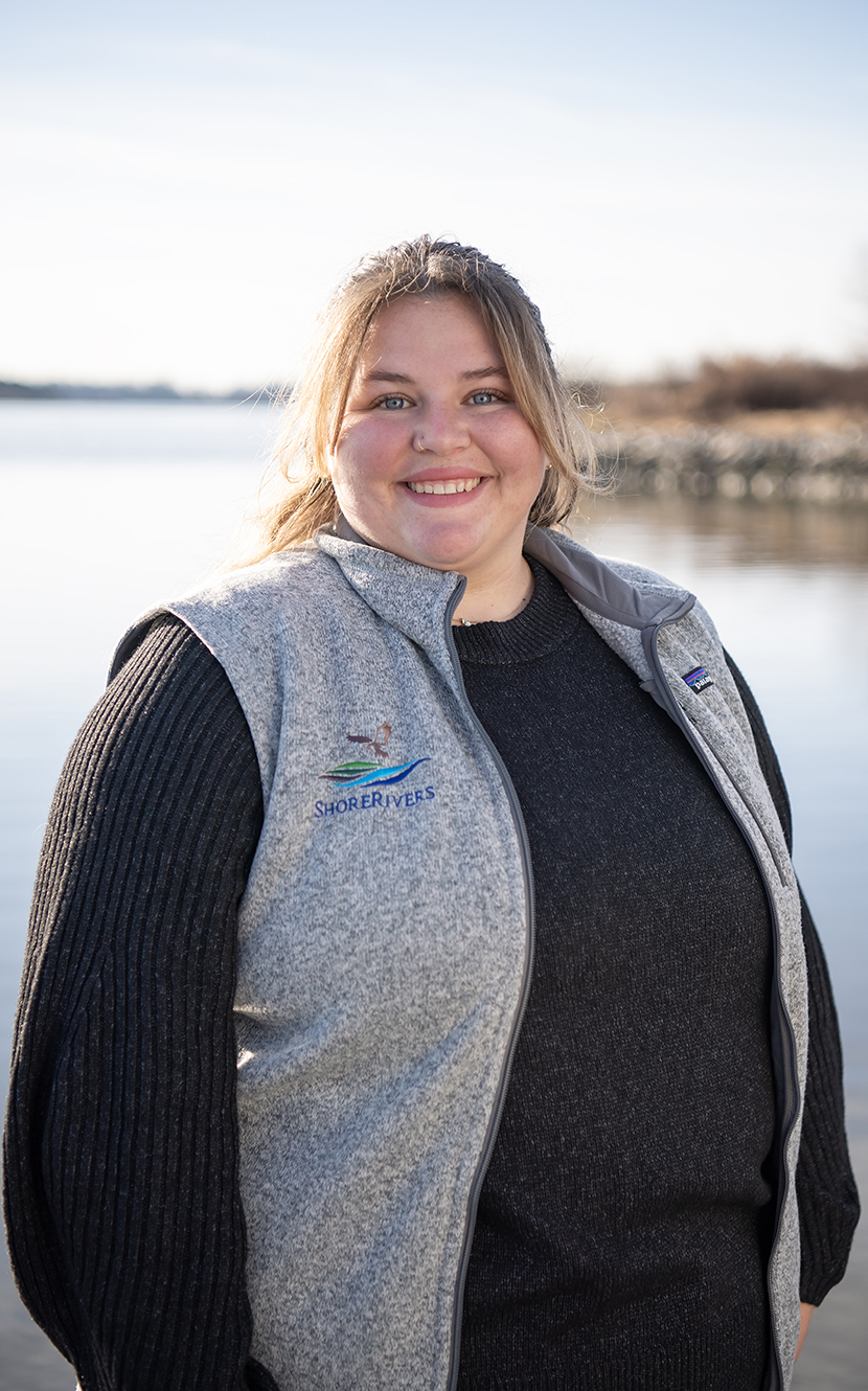 Maegan White '23 with water behind her